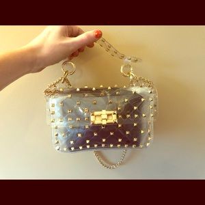 Clear Shoulder Bag with gold rivets and gold chain